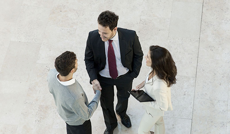 Young man meeting Managers for interview